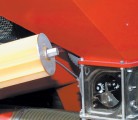 Driven by digitally controlled electric motors, these meters provide more precise metering than hydraulic or mechanical drive units. The housing attaches to the hopper bottom with four bolts. | Ron Lyseng photo