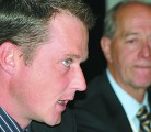 Grant Dyck, a Niverville, Man., farmer, left, and Steve Whitney of Canadian Pacific Railway discuss climate change at the Fields on Wheels conference. Whitney says weather changes can dramatically affect crop production and rail requirements. | Ed White photo