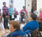 The Old Time Singers put on a show at Regency Manor care home in Central Butte, Sask. Some are full-time residents and others are drop-in clients picked up from surrounding communities. | Kristen McEwen photo