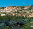 ABOVE: The Frenchman River winds its way toward the Cypress Hills. | Arlene and Robin Karpan photo