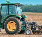The pneumatically actuated probe can pull up to 2,500 cores per hour. After collecting the cores, the soil travels via auger to the bagging machine in the tractor cab. | Agrobotics photo