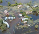 Floodwaters invade a farm near Gainsborough, Sask., during Saskatchewan premier Brad Wall’s July 2 aerial tour of flood-ravaged southeastern Saskatchewan. | Don Healy/Leader-Post photo