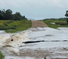 Paying farmers to maintain dugouts, sloughs and tree stands to retain water and reduce damage to roads and infrastructure should be examined by governments, says the author. | Robin Booker photo