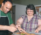 Evelyn Yelinek helps her son, Devon, with his cookie making business at Swan River, Man. Devon, who is blind and autistic, prepares cookie orders for individuals and groups. | Karen Morrison photo