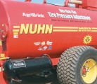 Ontario hog farmer Jake Kraayenbrink hauls millions of slurry gallons every year and was frustrated by having to wait at the field edge for the big flotation tires to inflate and deflate each time — the tires needed 40 p.s.i. for transit and 20 p.s.i. or less in the field. | Ron Lyseng photo