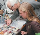 Jim and Rachelle Ternier examine the wide variety of seeds they save every year at Prairie Garden Seeds. The family operates gardens at their home farm at Cochin, Sask., and at St. Peter's Benedictine Abbey at Muenster, Sask. | Karen Morrison photo